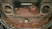 Front trunk inspection holes.