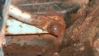 Frozen bumper bracket bolt after cut-off.
