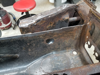 Inside view of the area cut out. The extent of the rust damage on the frame head is clearly visible.