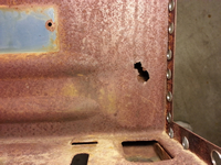 Hole in Back Panel of Compartment
