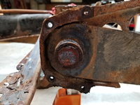 Driver Side Outer Spring Plate Bushing Removed.