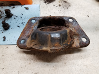 Driver Side Outer Spring Plate Bushing.