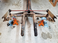 Both Spring Plates and Torsion Rods Removed.