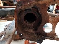Driver Side Bushing Housing with Inner Bushing Removed.