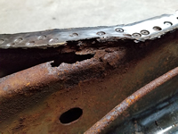 Buldging of Bottom Plate from Expanding Rust Layers.