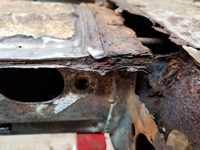 Layers of Rust Where Frame Head Bottom Plate Overlaps Tunnel Bottom Plate.
