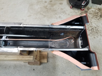 Side view of the tubing through the frame head.
